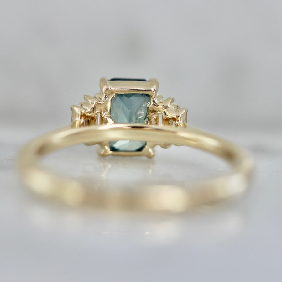 
            Bend &amp; Snap Teal Radiant Cut Opalescent Sapphire Ring