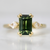 emerald cut green sapphire ring
