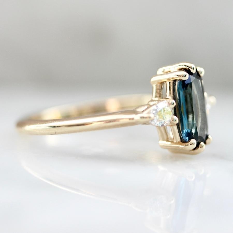 
            Love Shack Blue-Green Elongated Oval Cut Spinel Ring