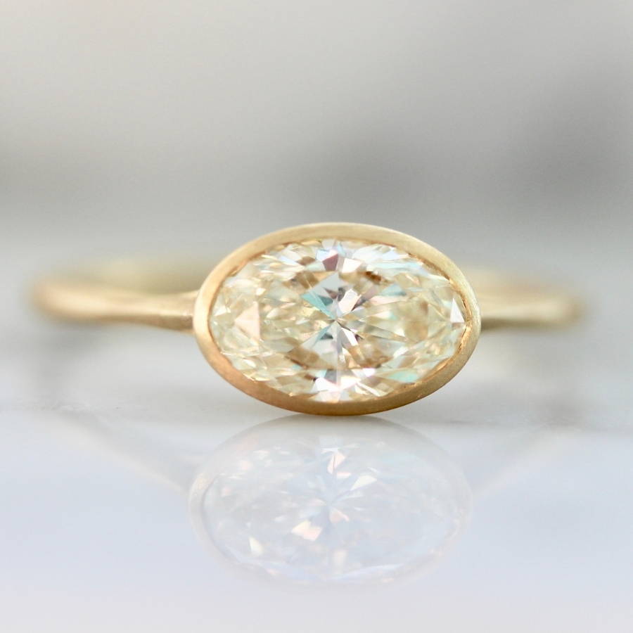 Oval Cut Bezel Set Engagement Ring