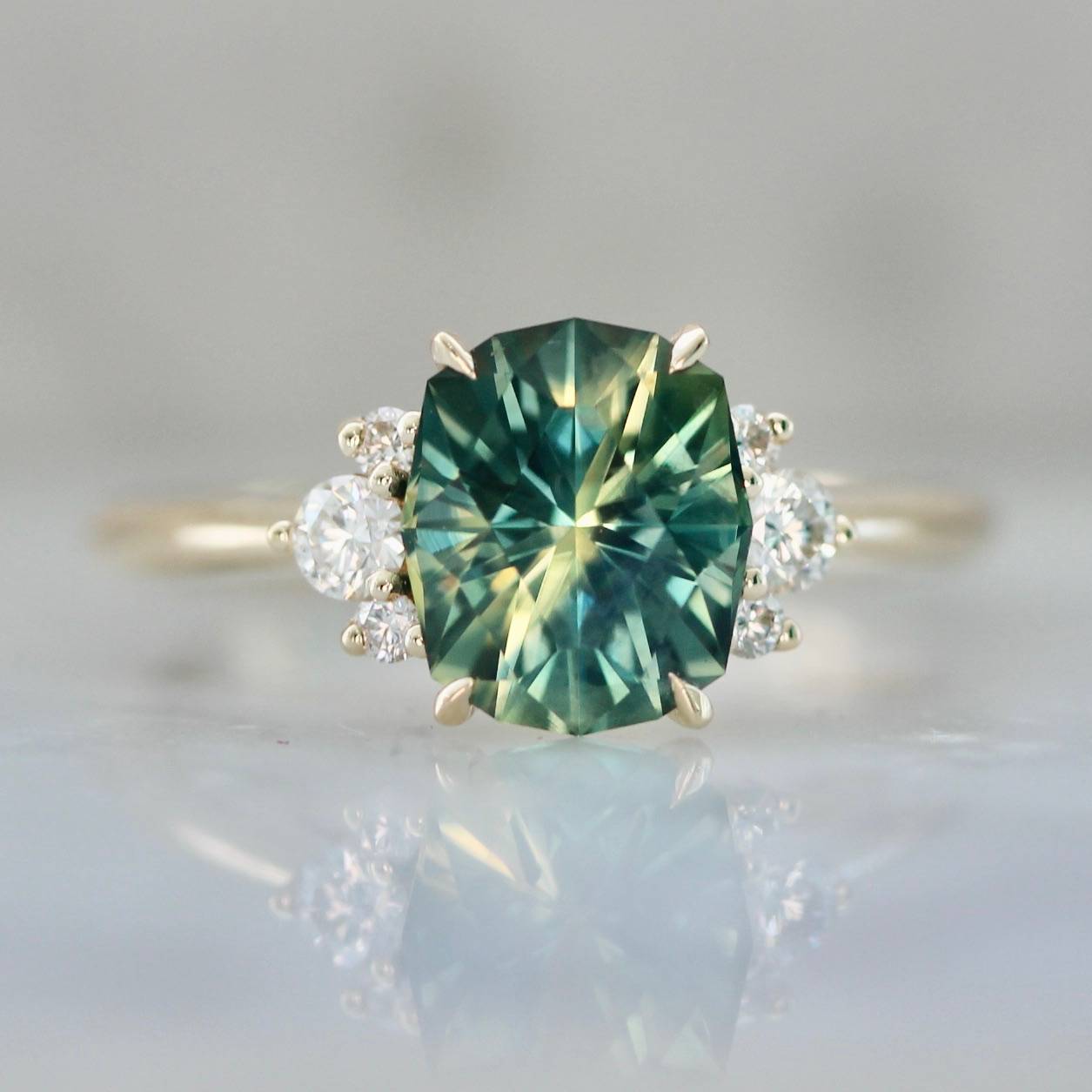 green sapphire engagement ring