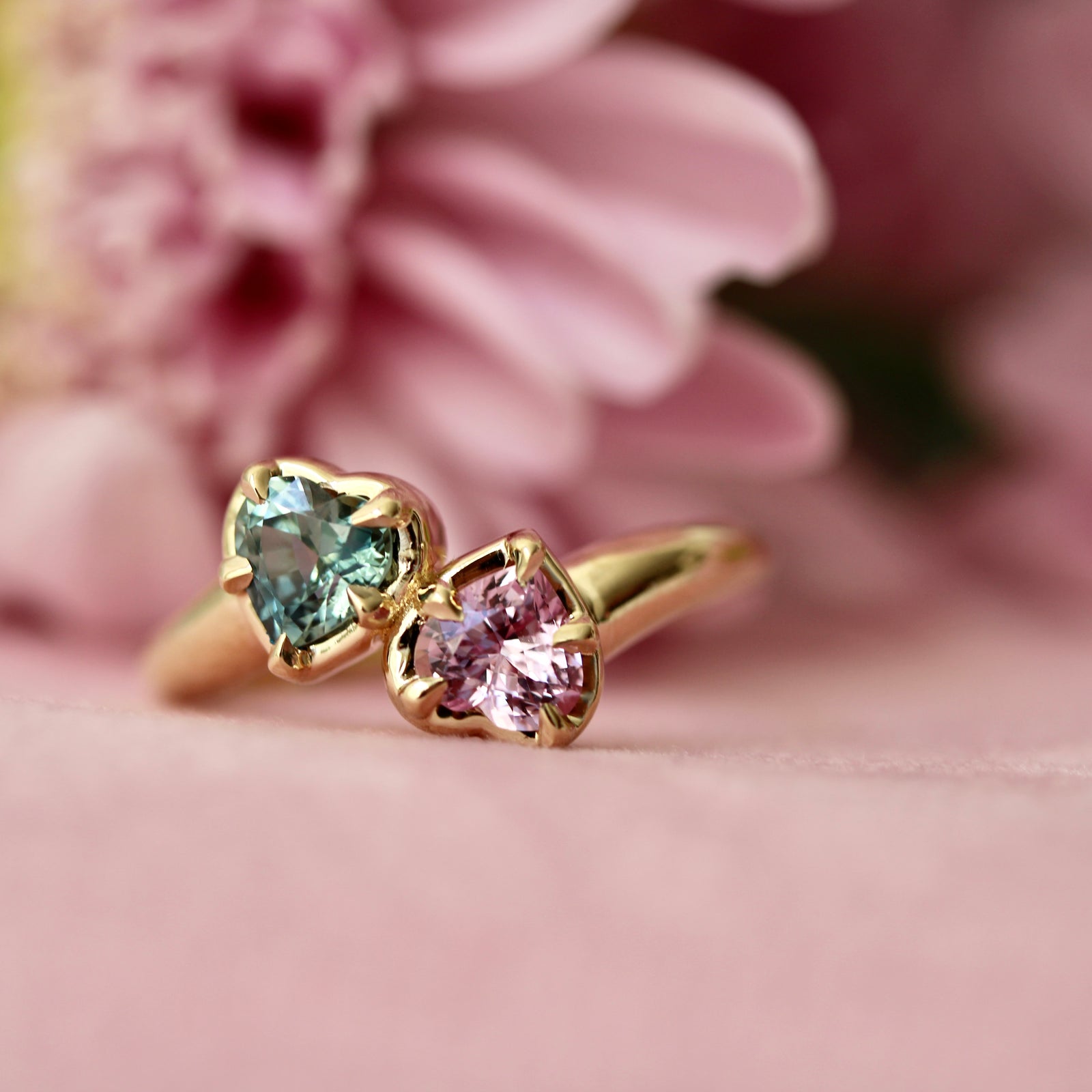 Wicked inspired ring with heart shaped pink and green sapphires in a yellow gold toi et moi setting by Gem Breakfast