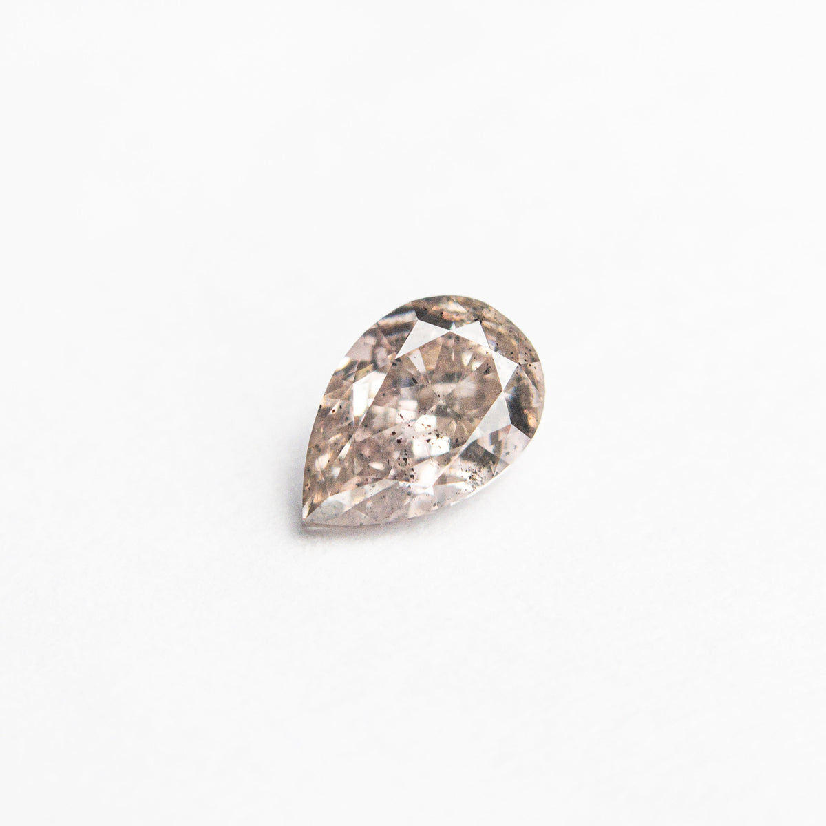 
            0.34ct 5.35x3.56x2.35mm I1 Fancy Pink-Brown Pear Brilliant 24119-01