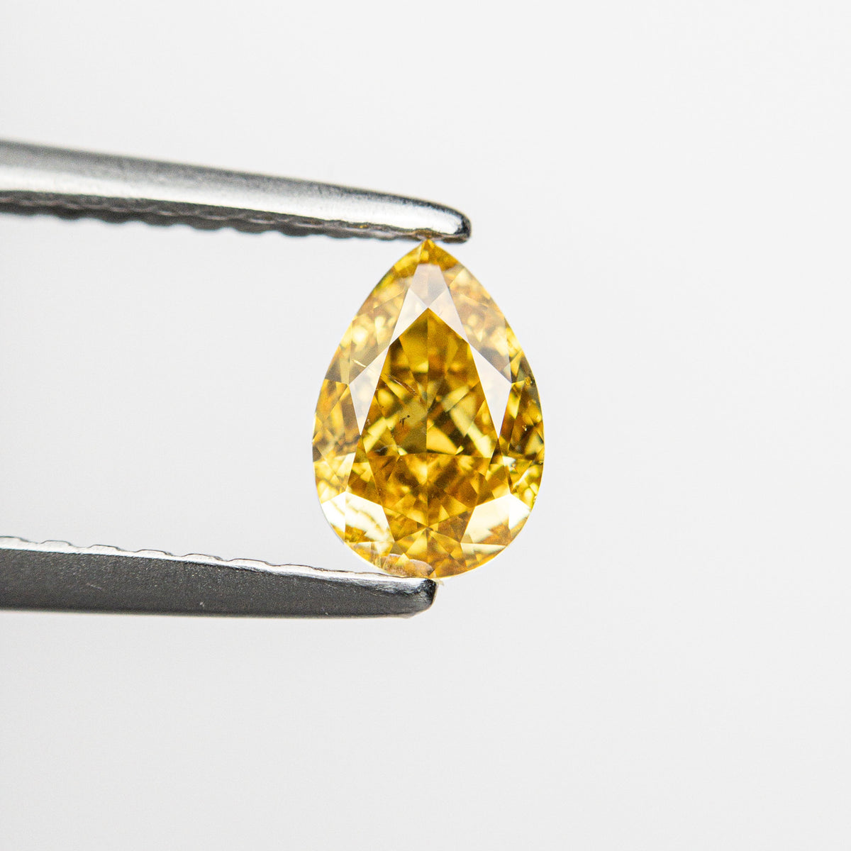 
            0.50ct 6.13x4.13x2.67mm SI2 Fancy Deep Yellowish Orange Pear Brilliant 24129-01