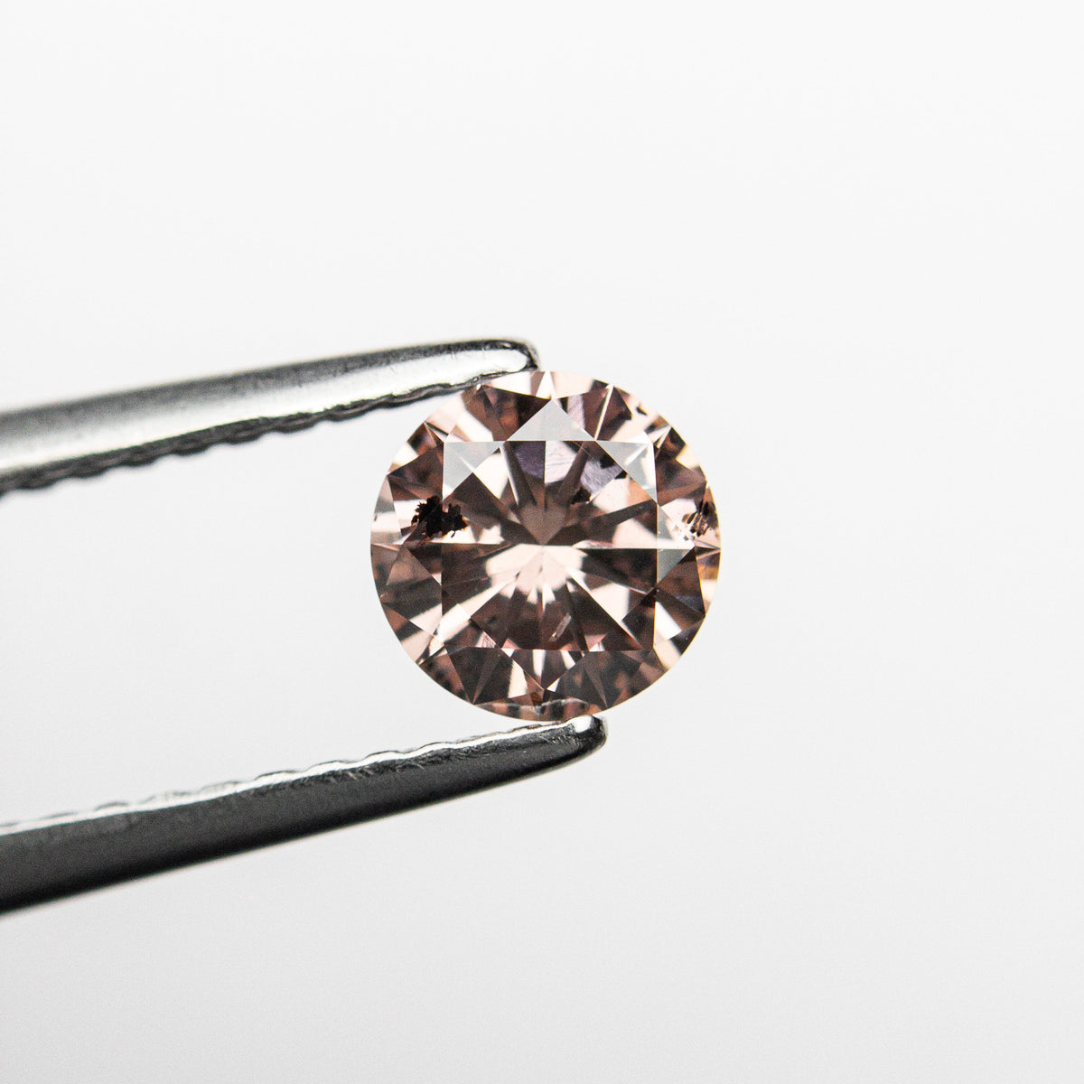 
            0.51ct 5.31x5.27x3.05mm GIA Fancy Deep Brownish Orangy Pink Round Brilliant 24146-01