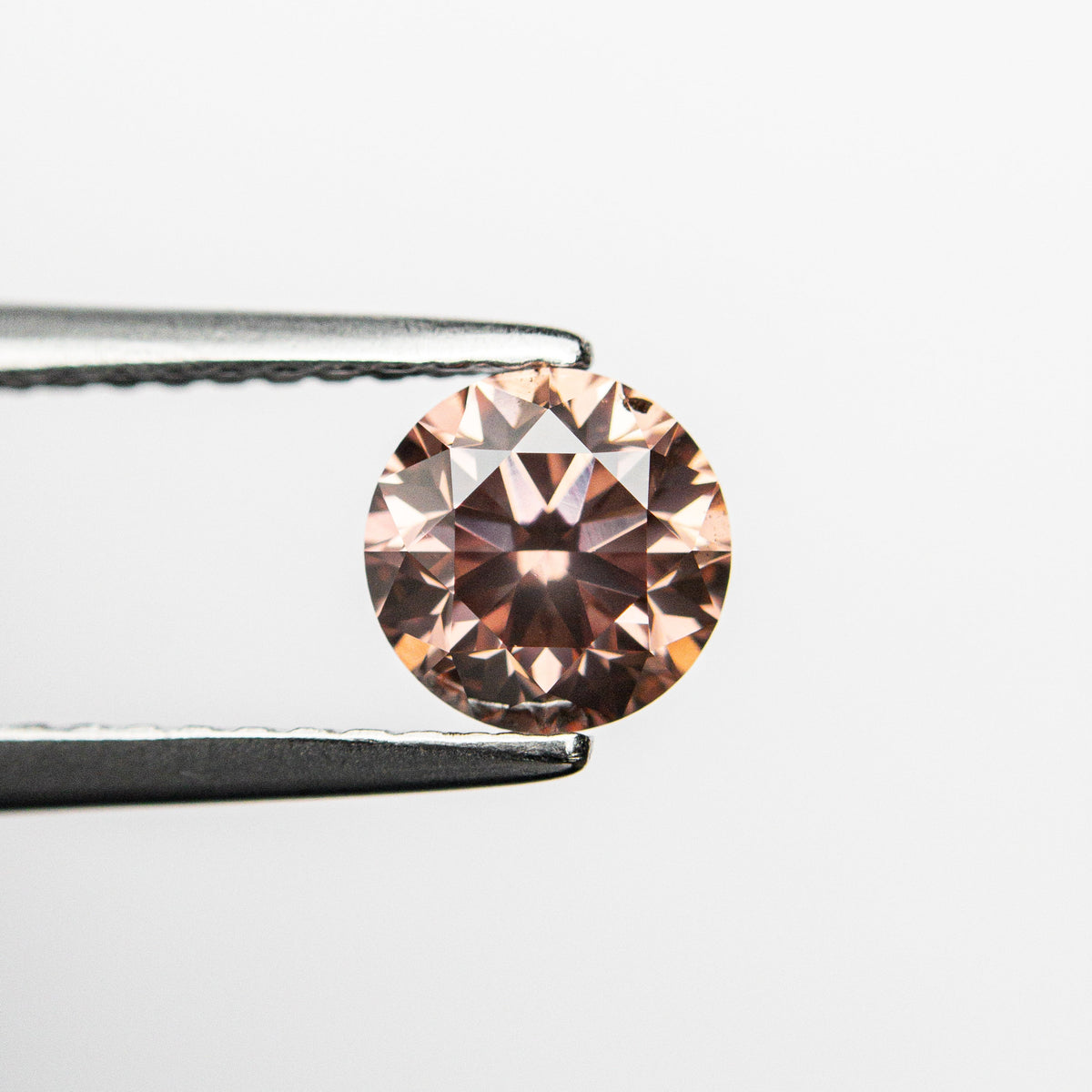 
            0.70ct 5.51x5.48x3.62 GIA SI1 Fancy Deep Orangy Pink Round Brilliant 🇦🇺 24147-01