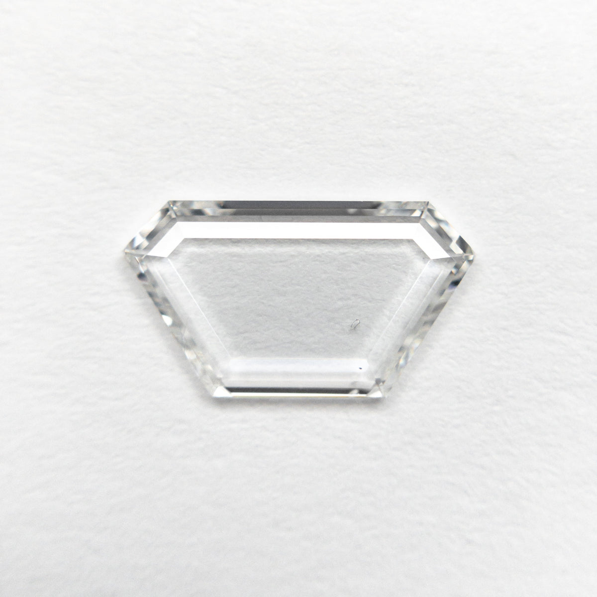 
            0.81ct 10.96x6.05x1.08mm SI1 G Trapezoid Portrait Cut 19854-25