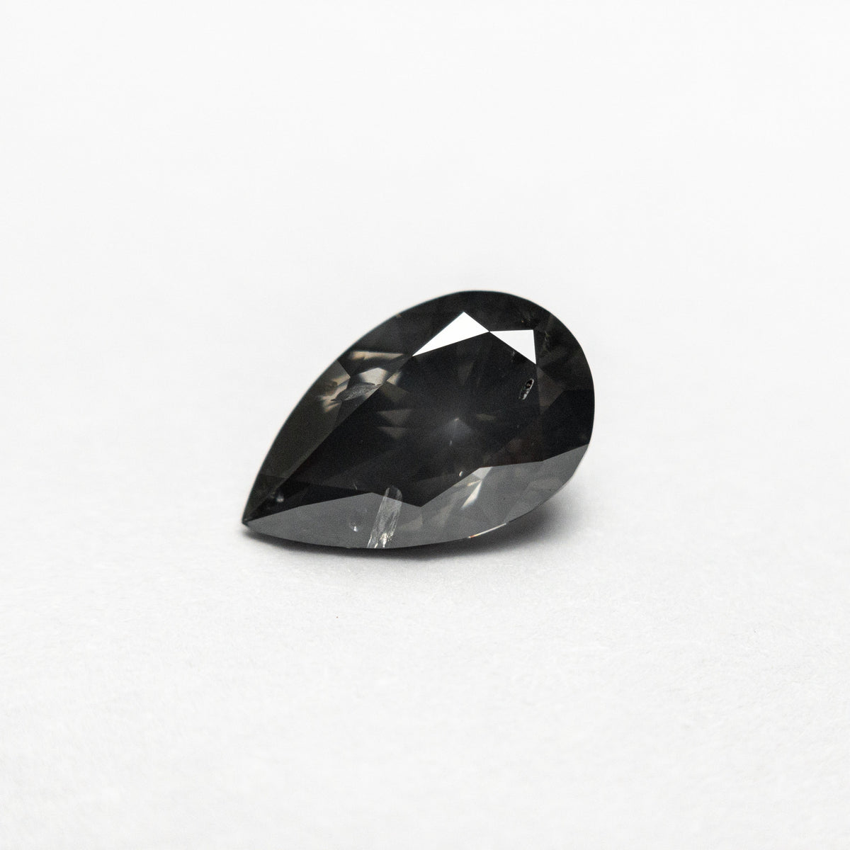 
            1.03ct 8.71x5.43x3.57mm Fancy Dark Grey Pear Brilliant 19913-16