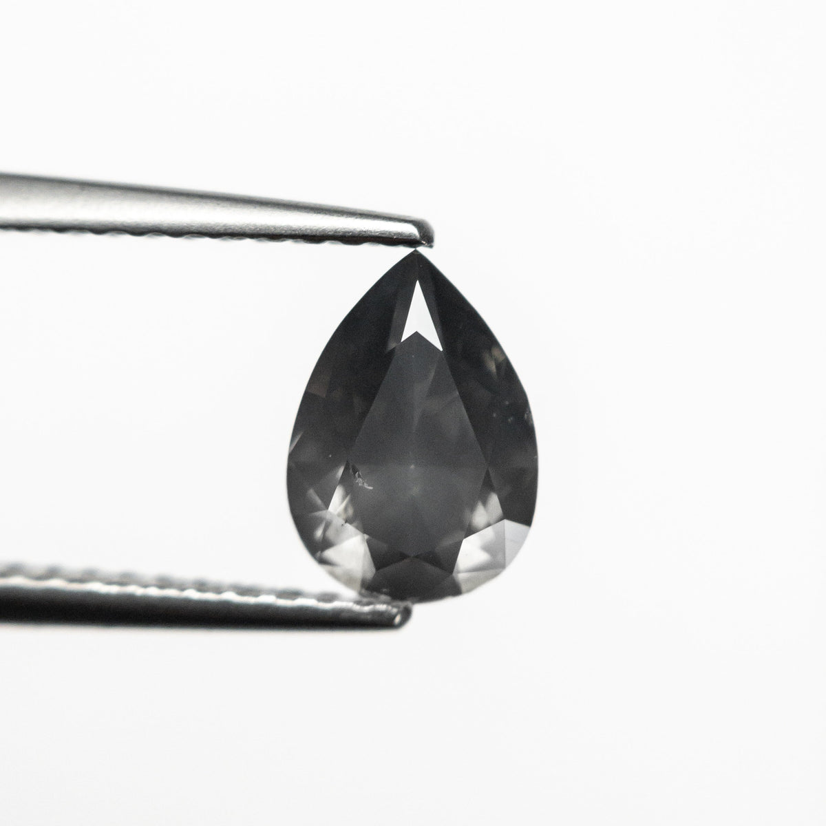 
            1.04ct 7.98x5.69x3.34mm SI1 Fancy Dark Grey Pear Brilliant 19913-24