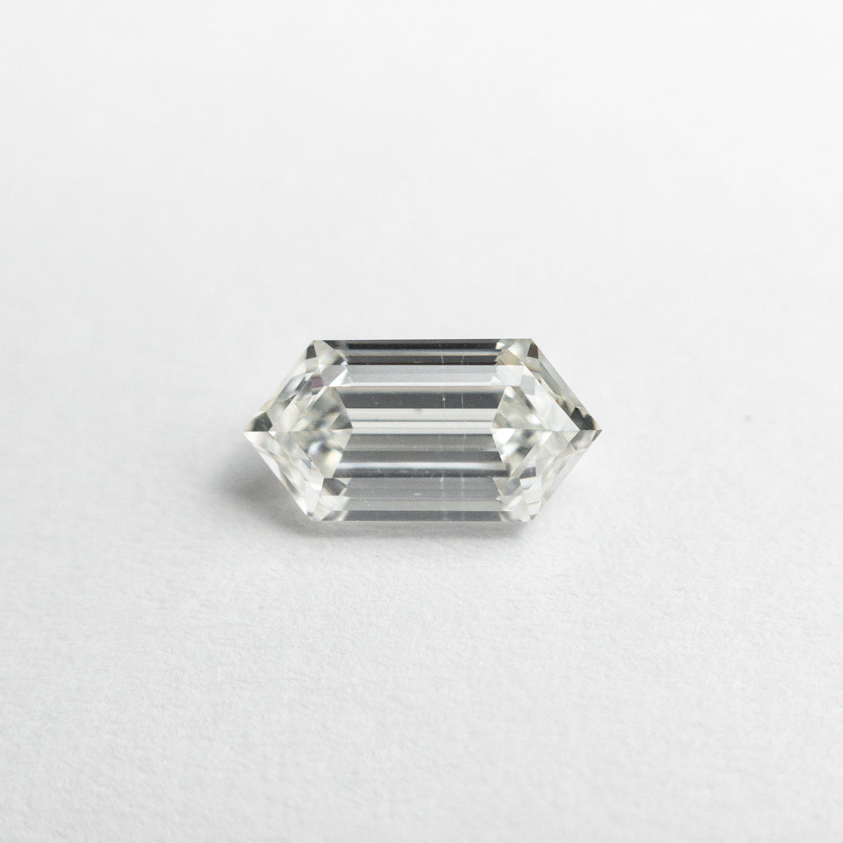 
            0.78ct 7.96x4.03x2.85mm SI2 G Hexagon Step Cut 20729-01