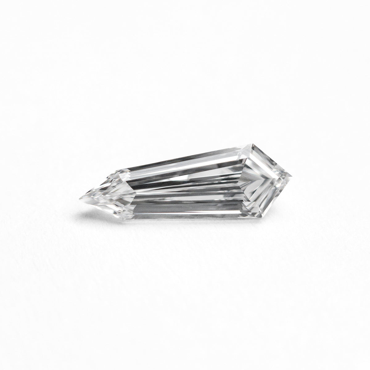 
            0.50ct 9.65x3.36x2.12mm VS2 E Shield Step Cut 21206-01