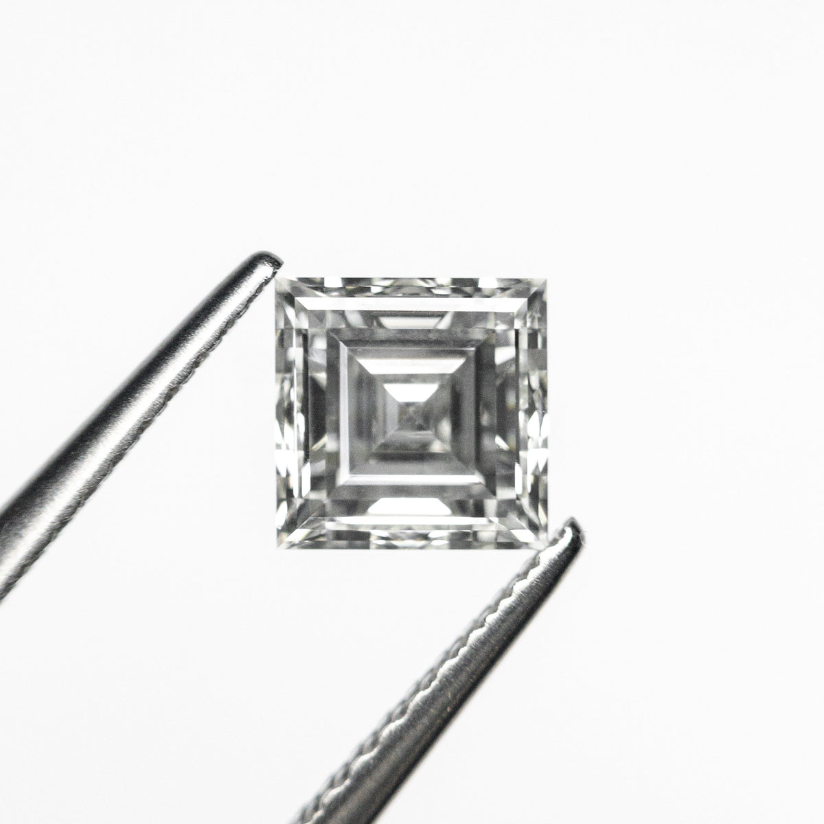 
            0.84ct 5.39x5.39x3.12mm GIA H VS2 Carré Step Cut 23034-01