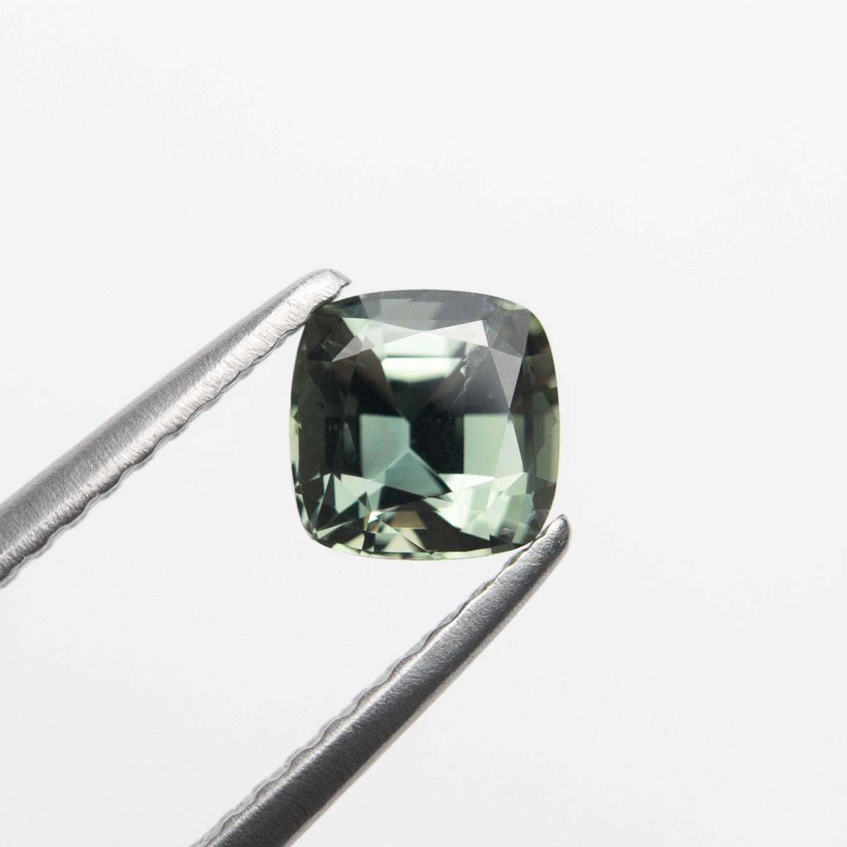 
            0.86ct 5.15x5.12x3.60mm Cushion Brilliant Sapphire 23045-01