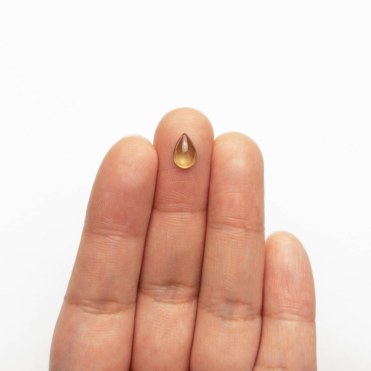 
            1.24ct 8.57x5.70x2.85mm Pear Cabochon Cut Sapphire 23059-01