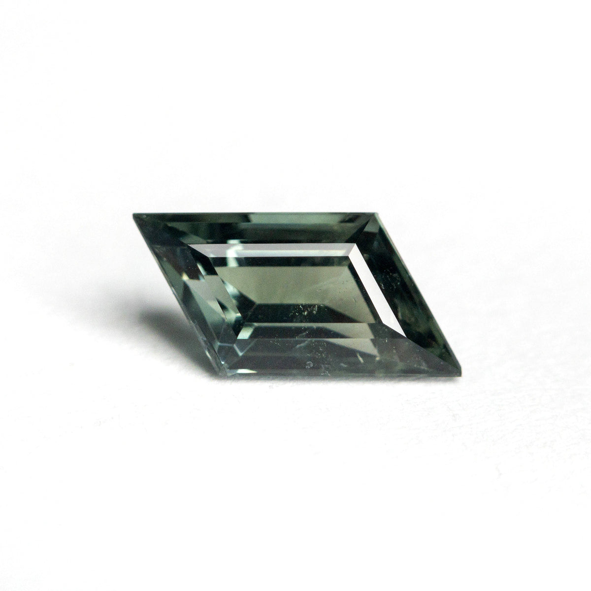 
            1.24ct 10.35x6.38x3.56mm Geometric Step Cut Sapphire 23060-01