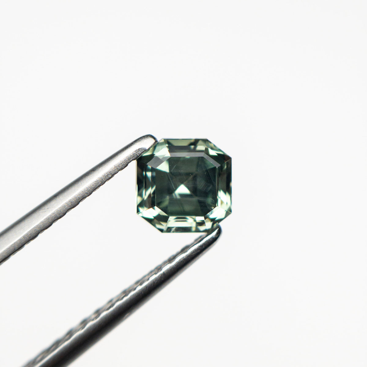 
            0.88ct 4.98x4.89x3.93mm Cut Corner Square Step Cut Sapphire 23903-10