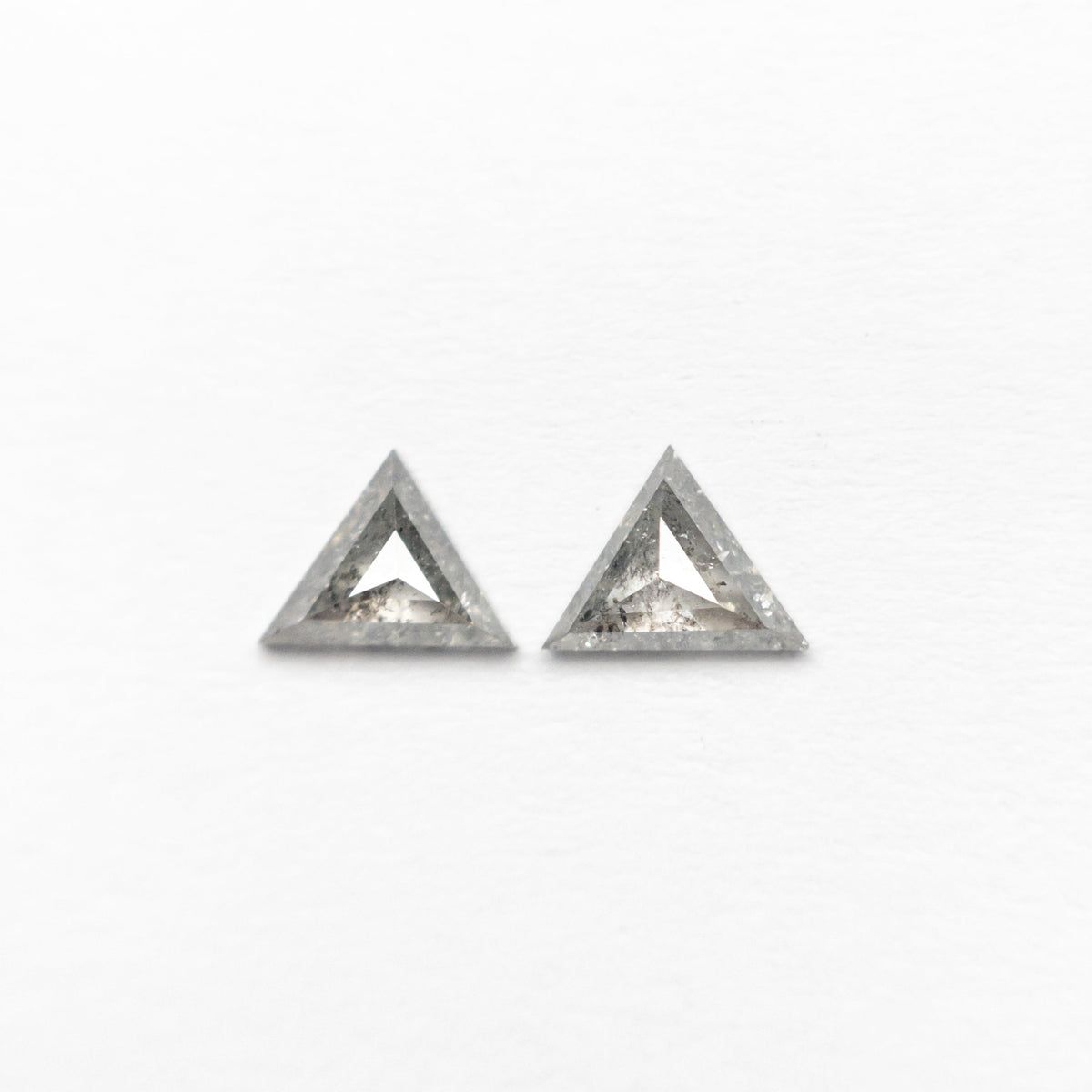 
            0.23cttw 4.42x3.37x1.39mm 4.46x3.44x1.31mm Triangle Rosecut Matching Pair 24464-01