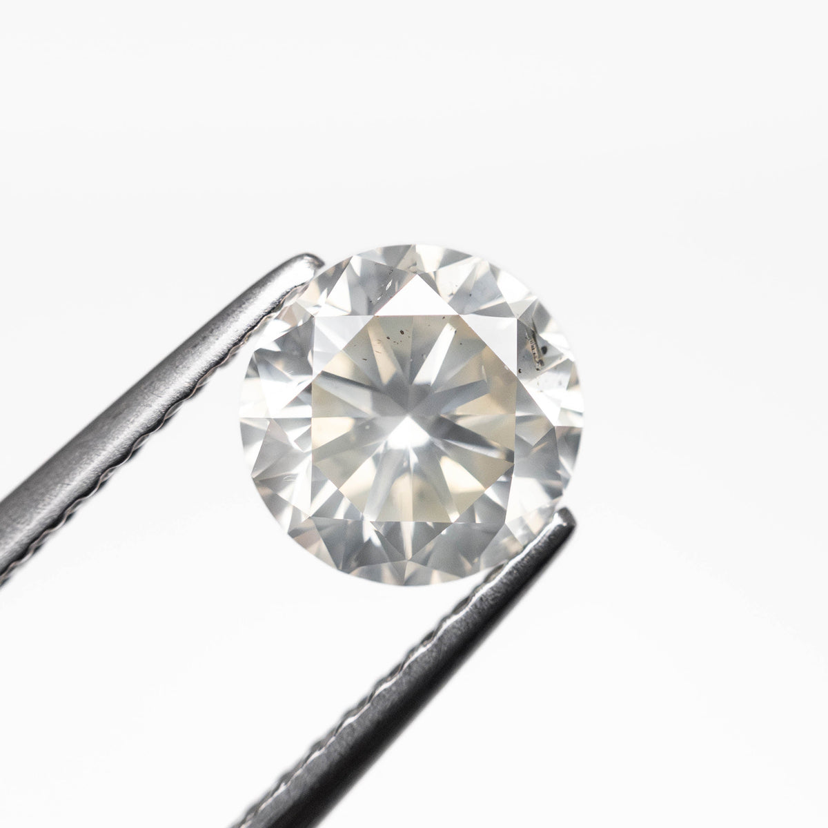 
            1.05ct 6.38x6.35mm SI2 Fancy Grey Round Brilliant 24514-06