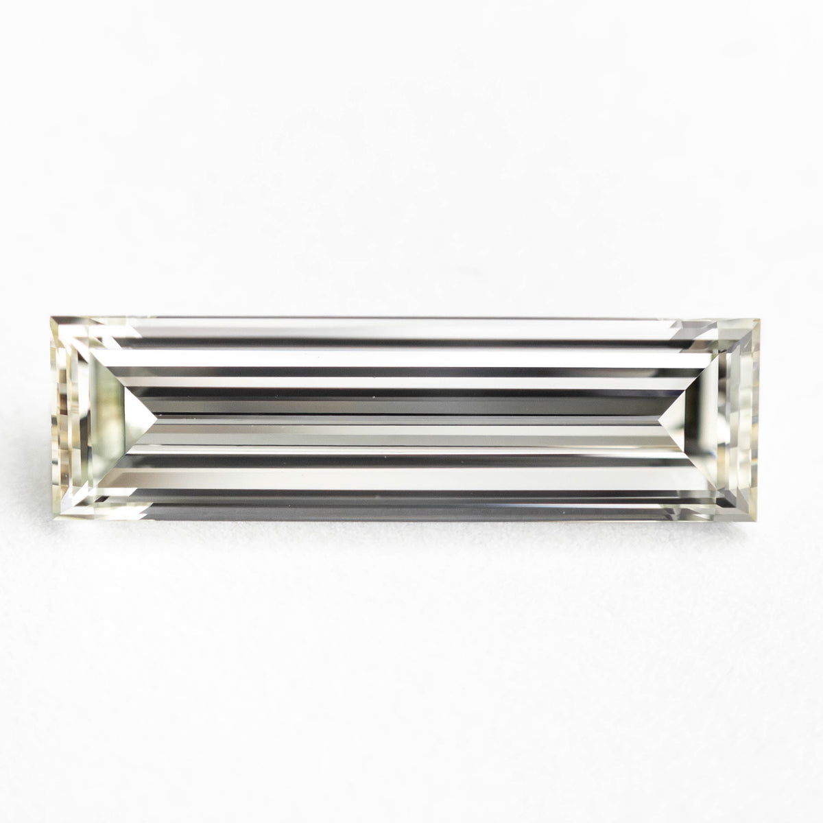 
            1.31ct 13.12x3.81x2.38mm VS1 L-M Baguette Step Cut 24700-01