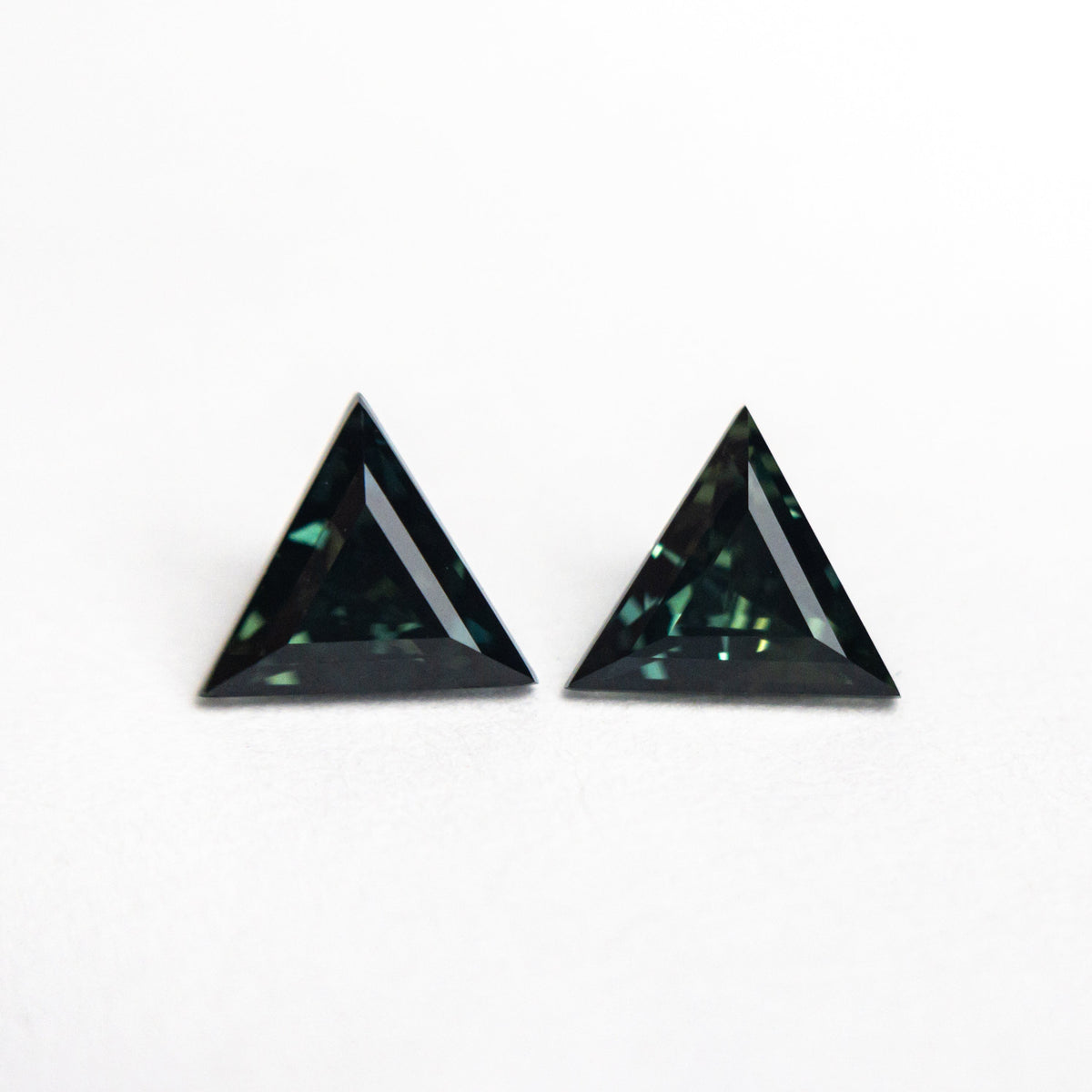 
            0.83cttw 2pc 5.03x5.69x2.92mm 4.98x5.61x2.75mm Triangle Step Cut Sapphire Matching Pair 25110-03