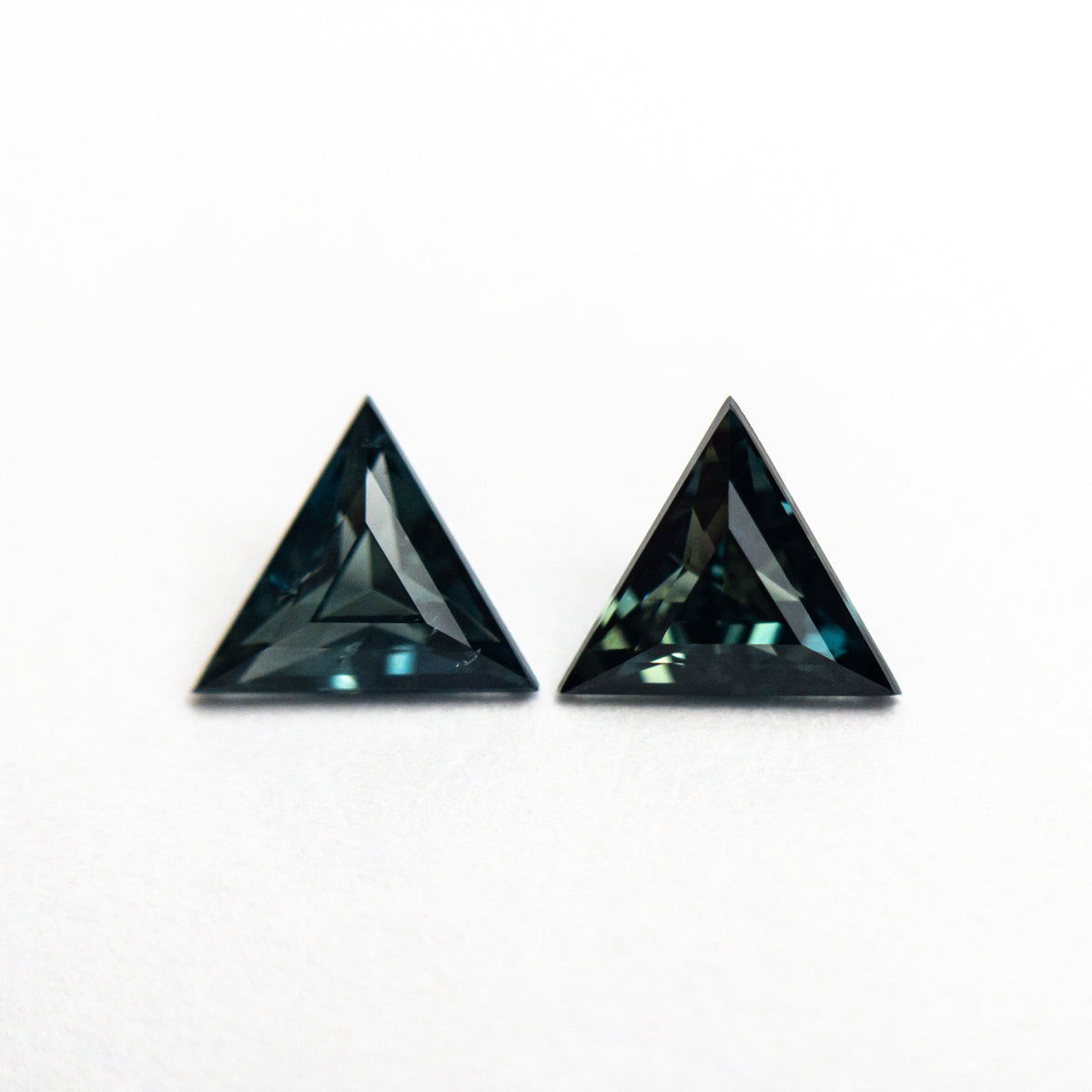 
            0.79cttw 2pc 5.04x5.69x2.50mm 5.02x5.71x2.87mm Triangle Step Cut Sapphire Matching Pair 25110-06