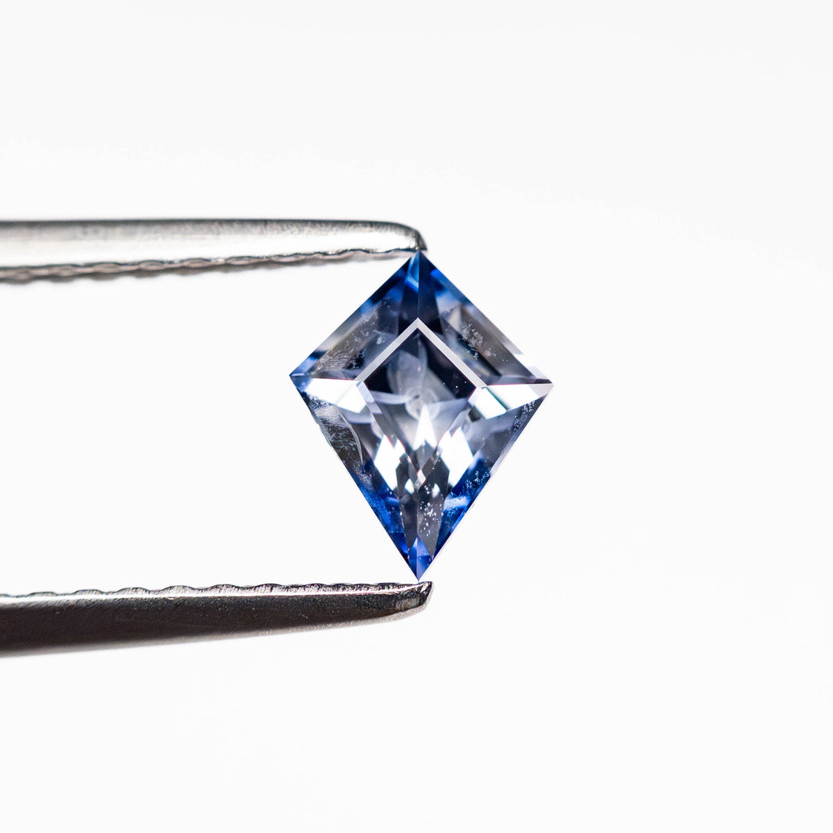 
            0.53ct 6.30x5.00x3.18mm Kite Step Cut Sapphire 25171-04