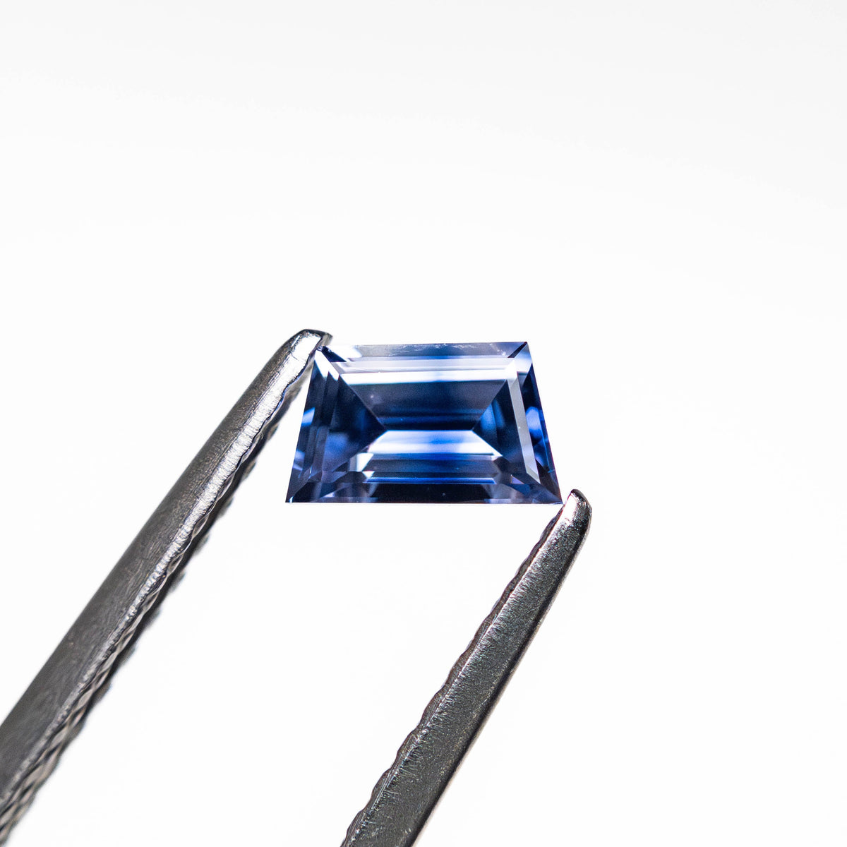 
            0.42ct 5.16x3.02x2.50mm Trapezoid Step Cut Sapphire 25171-05