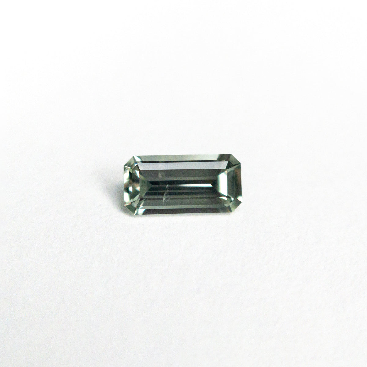 
            0.40ct 6.05x3.02x2.04mm Cut Corner Rectangle Step Cut Sapphire 25443-01