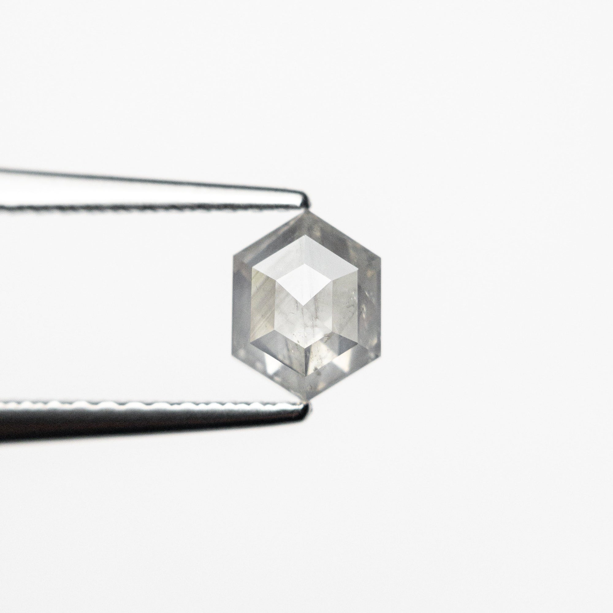 0.71ct 6.20x4.76x2.77mm Hexagon Step Cut 25457-18