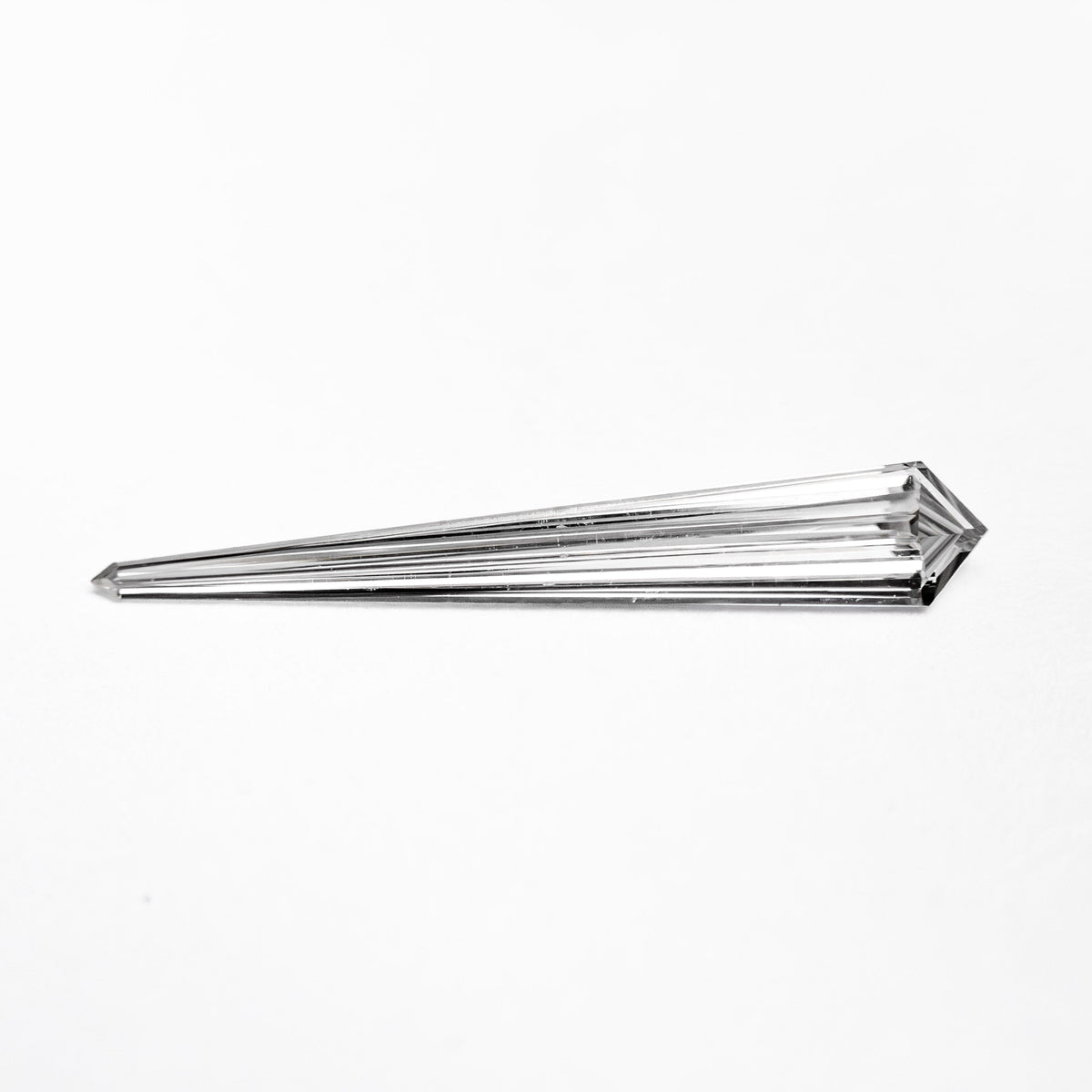 
            0.15ct 13.67x2.19x0.95mm SI1 E Kite Step Cut 25494-03