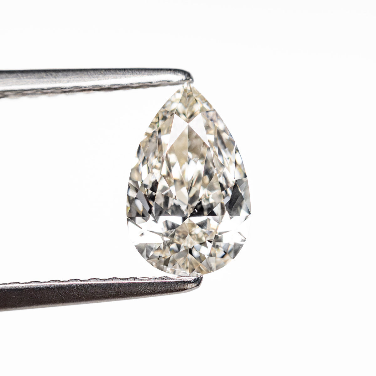 
            0.91ct 8.68x5.48x3.08mm VS2 M-N Pear Brilliant 🇨🇦 25690-07