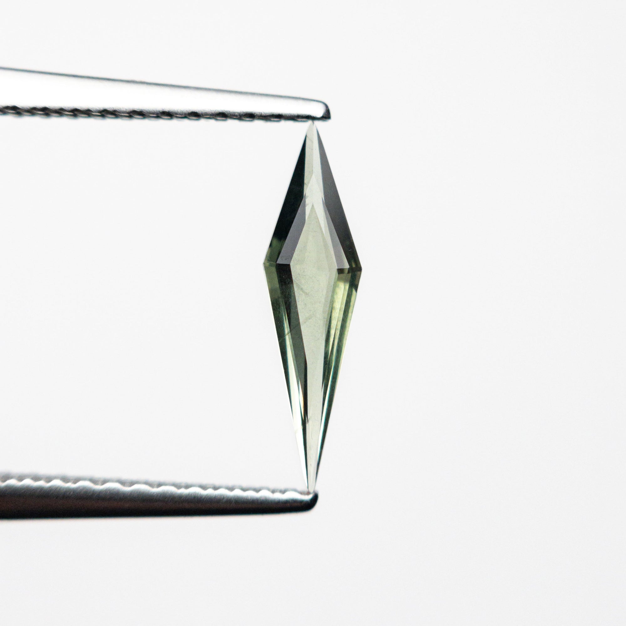 0.35ct 11.64x3.08x1.53mm Kite Step Cut Sapphire 25740-16