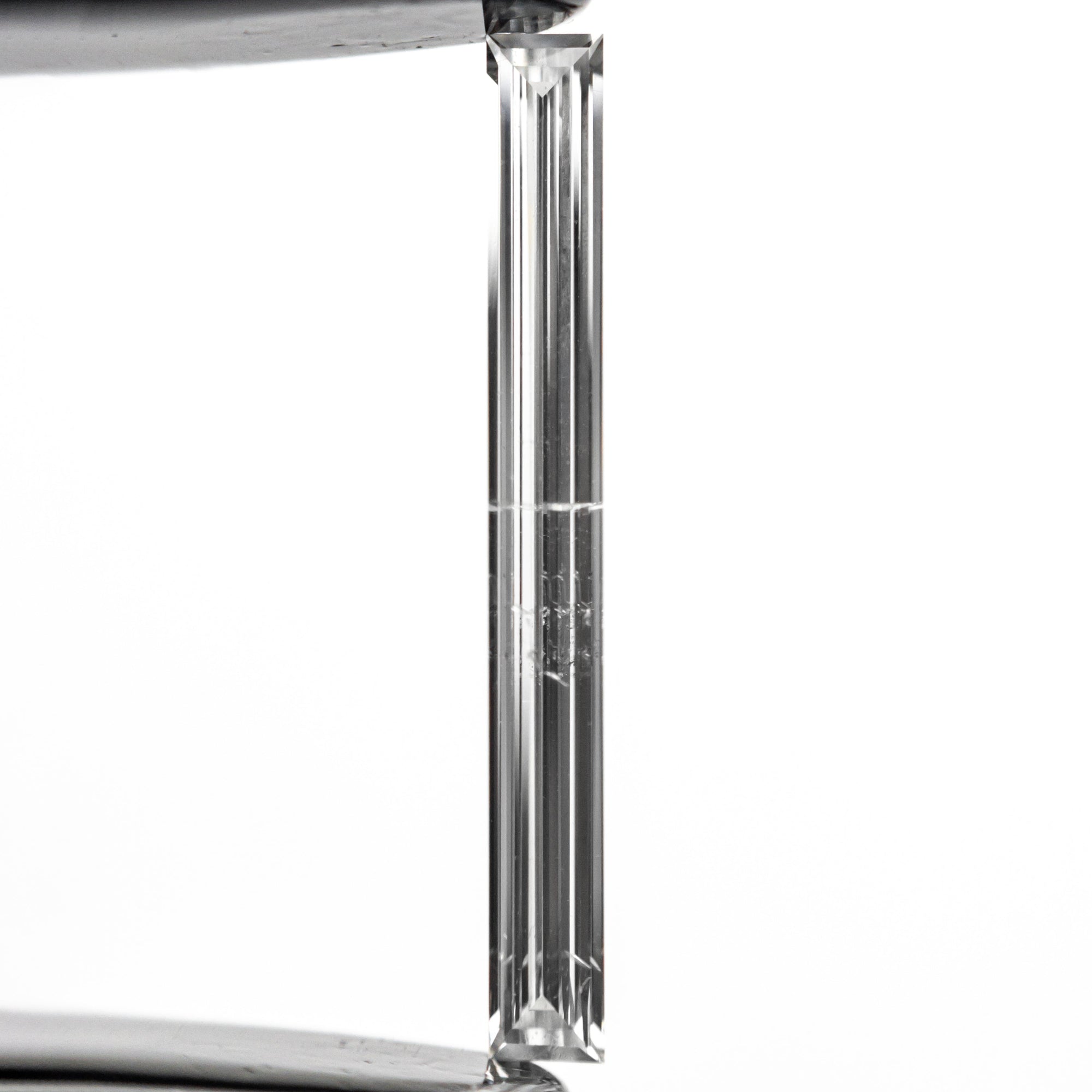 0.52ct 19.44x2.17x1.09mm SI2 E Baguette Step Cut 26545-01