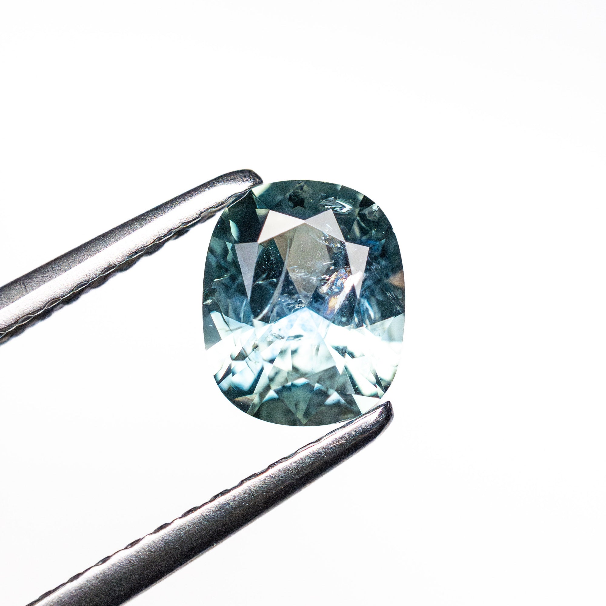 0.99ct 6.59x5.40x3.53mm Cushion Brilliant Sapphire 26673-12