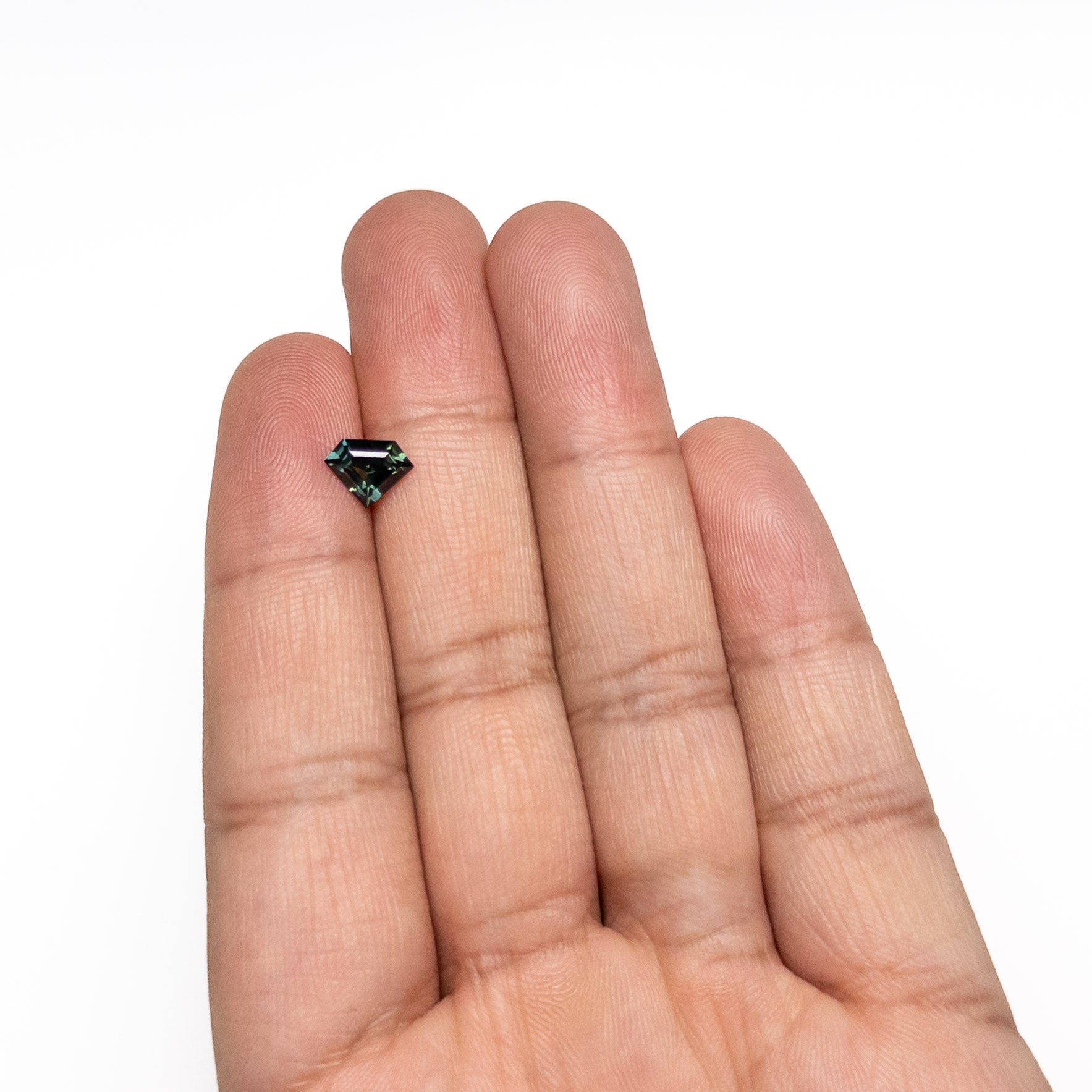 1.30ct 6.72x8.55x3.80mm Shield Step Cut Sapphire 26724-01