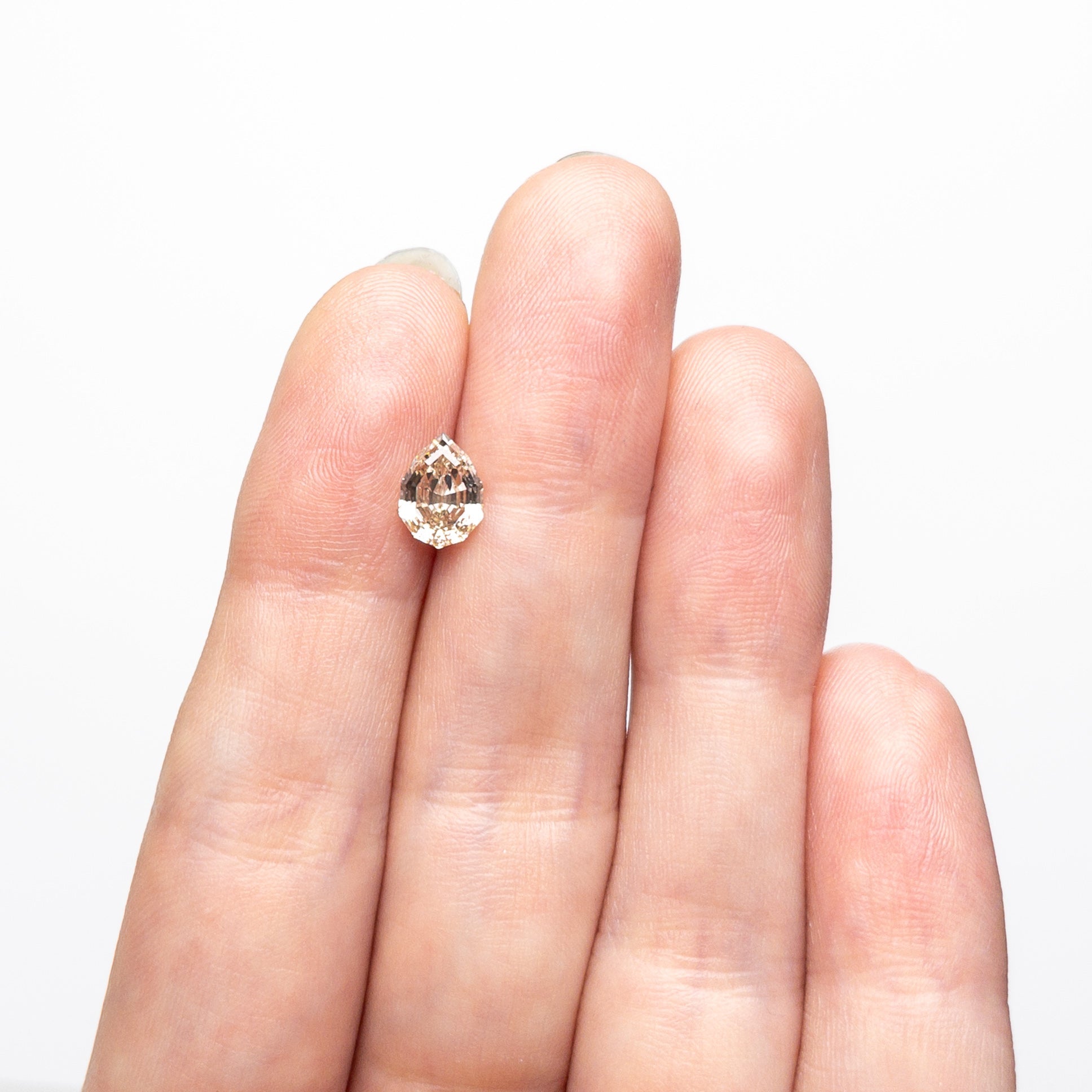 1.22ct 7.86x5.69x3.95mm VS2 C3 Geo Pear Step Cut 🇨🇦 26854-01