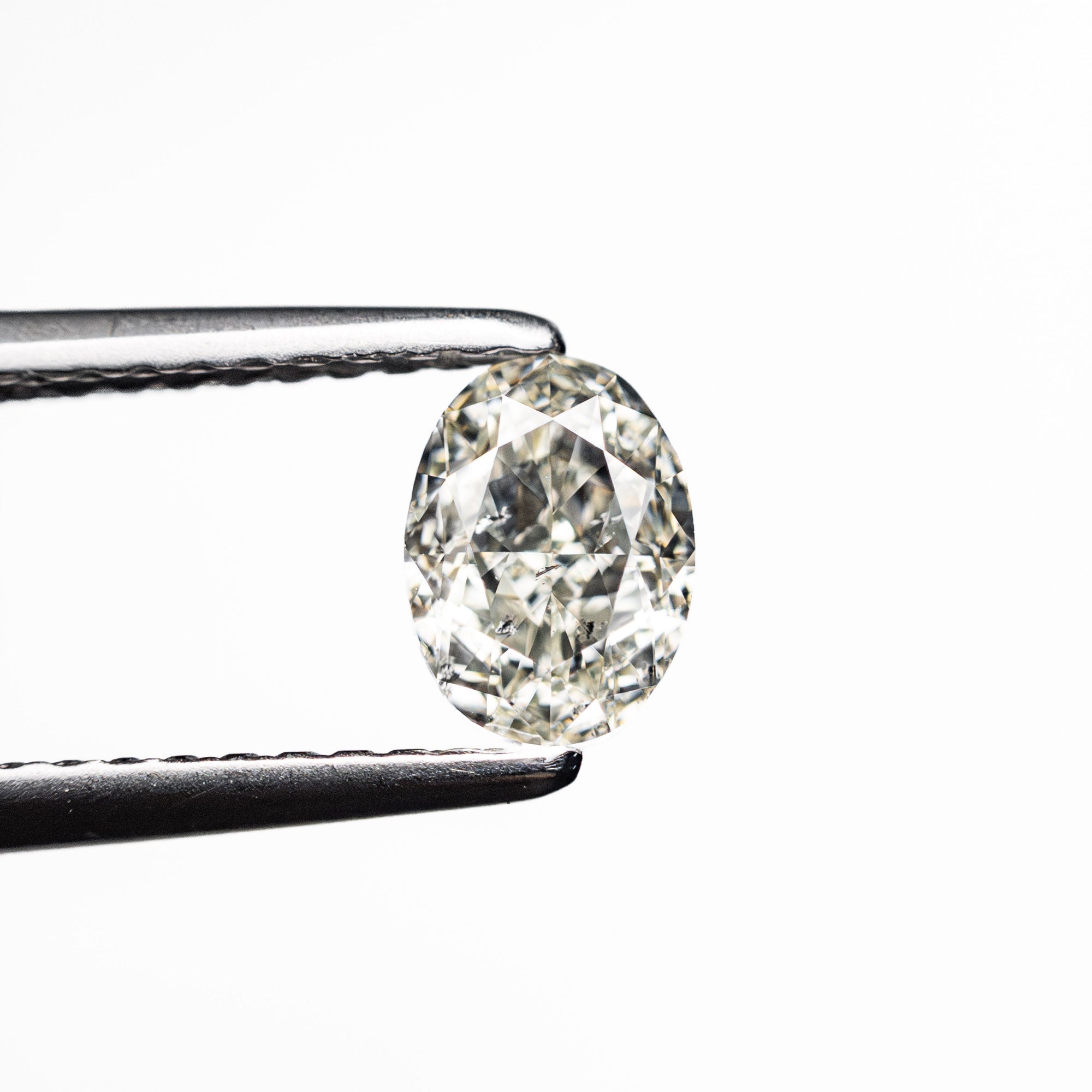 0.70ct 6.09x4.50x3.04mm SI2 K Oval Brilliant 27065-05