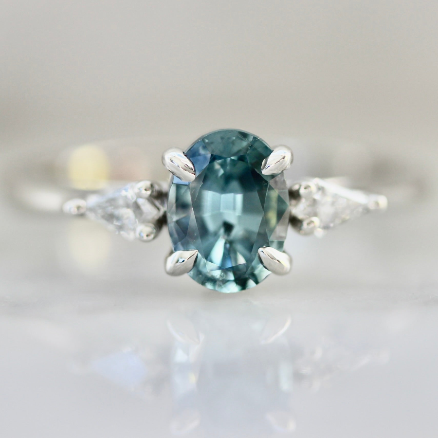 oval-cut-teal-montana-sapphire-engagement-ring-white-gold