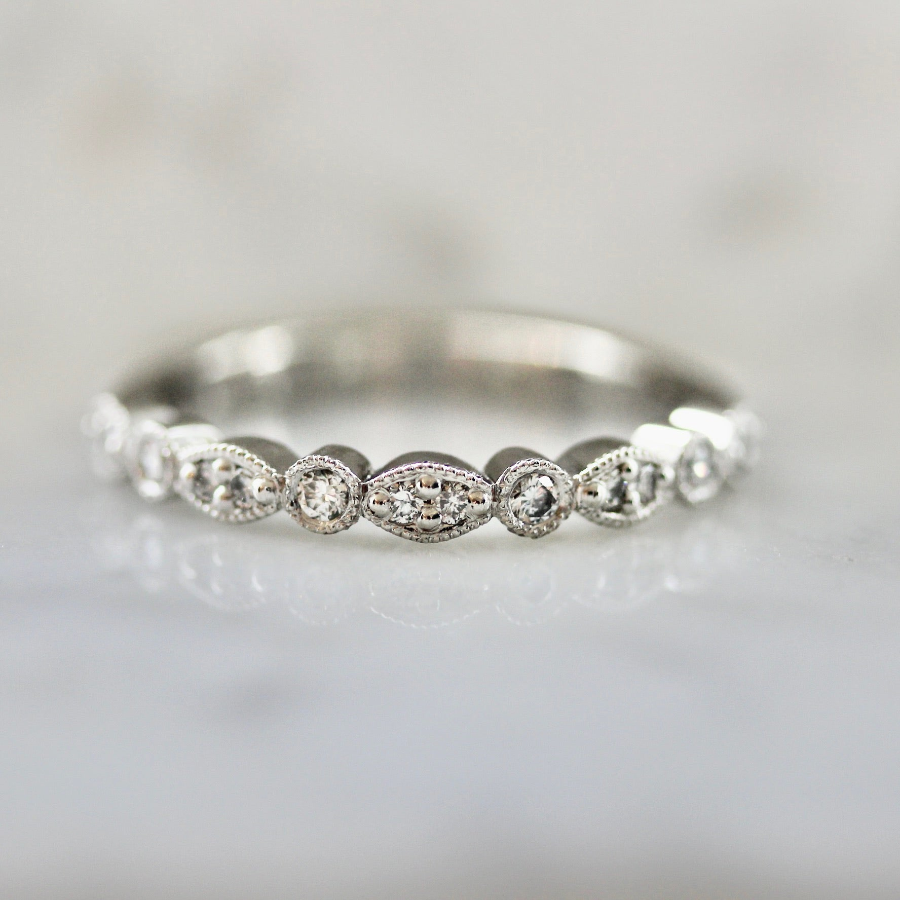 Vintage inspired platinum wedding band with mixed cut diamonds and milgrain bezels by Gem Breakfast