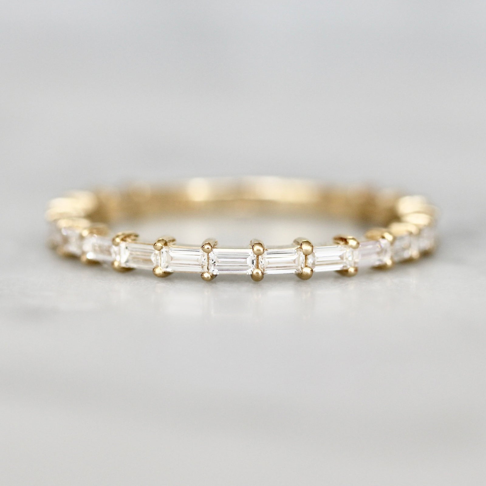 Baguette Diamond custom wedding band in 14k yellow gold by Gem Breakfast