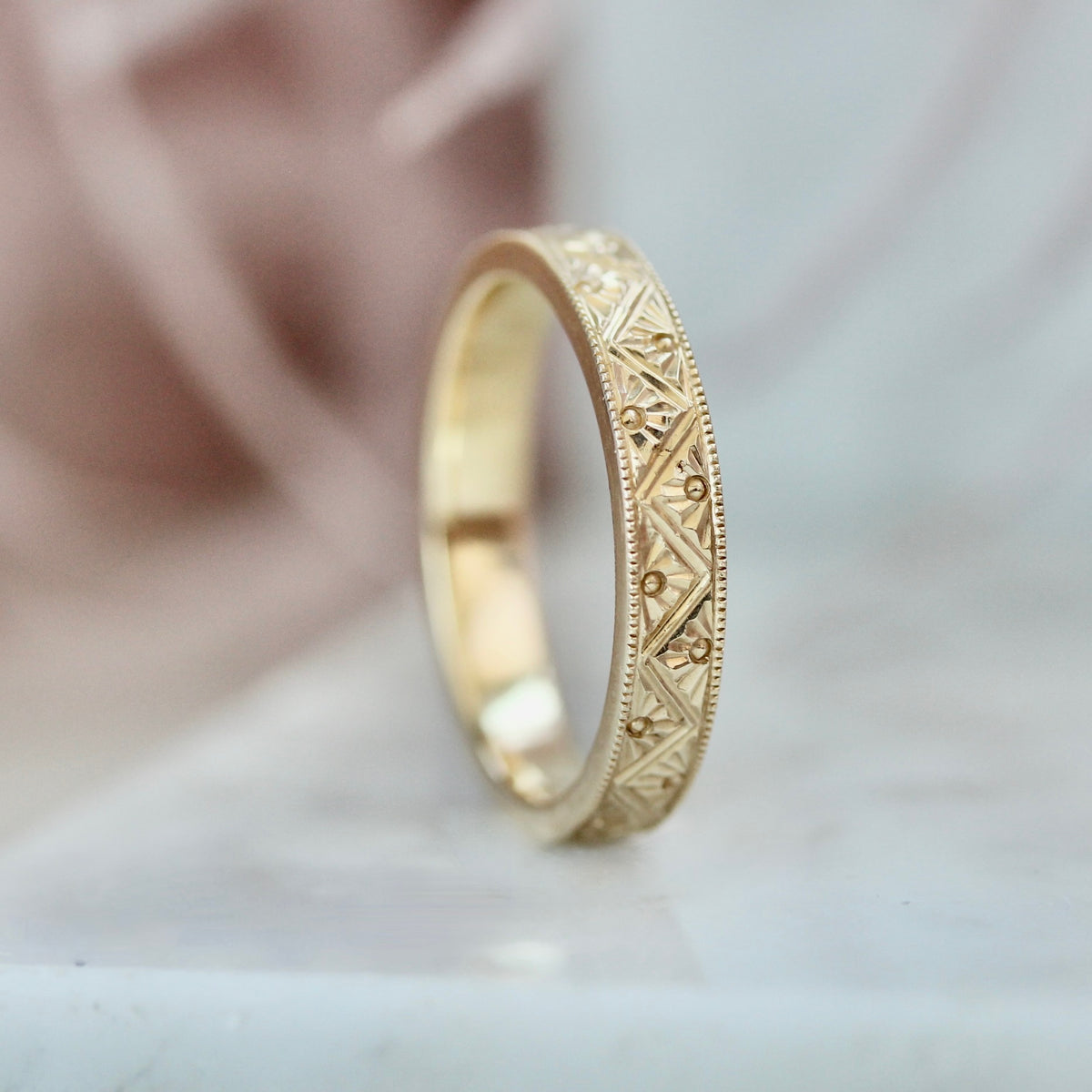 
            art deco hand engraved wedding band 