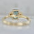 Bend & Snap Teal Radiant Cut Opalescent Sapphire Ring