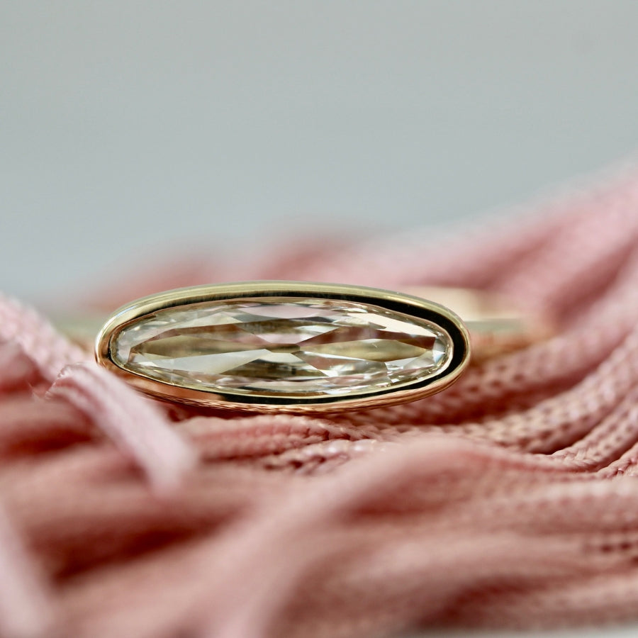 
            Bezel Moval cut Diamond engagement Ring