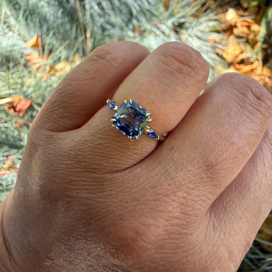 
            Blue-White Radiant Cut Sapphire Ring