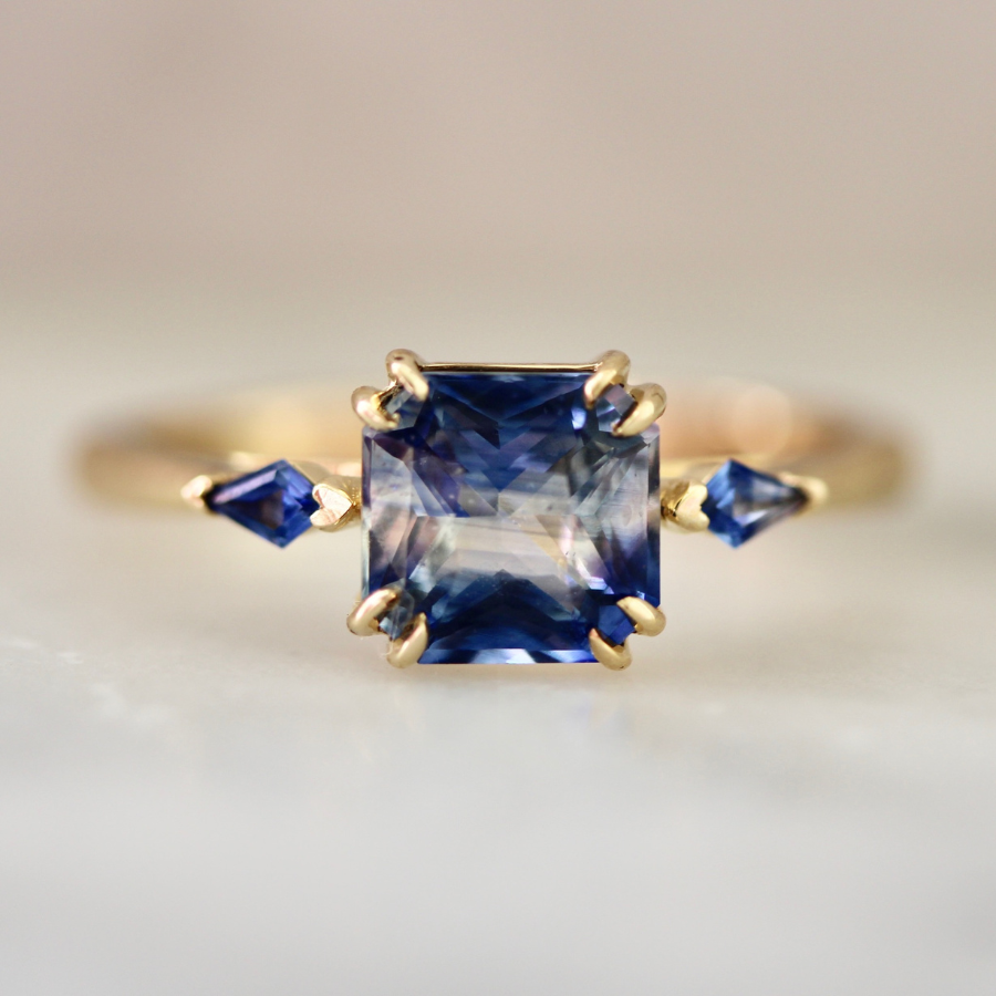 
            Blue-White Radiant Cut Sapphire Ring