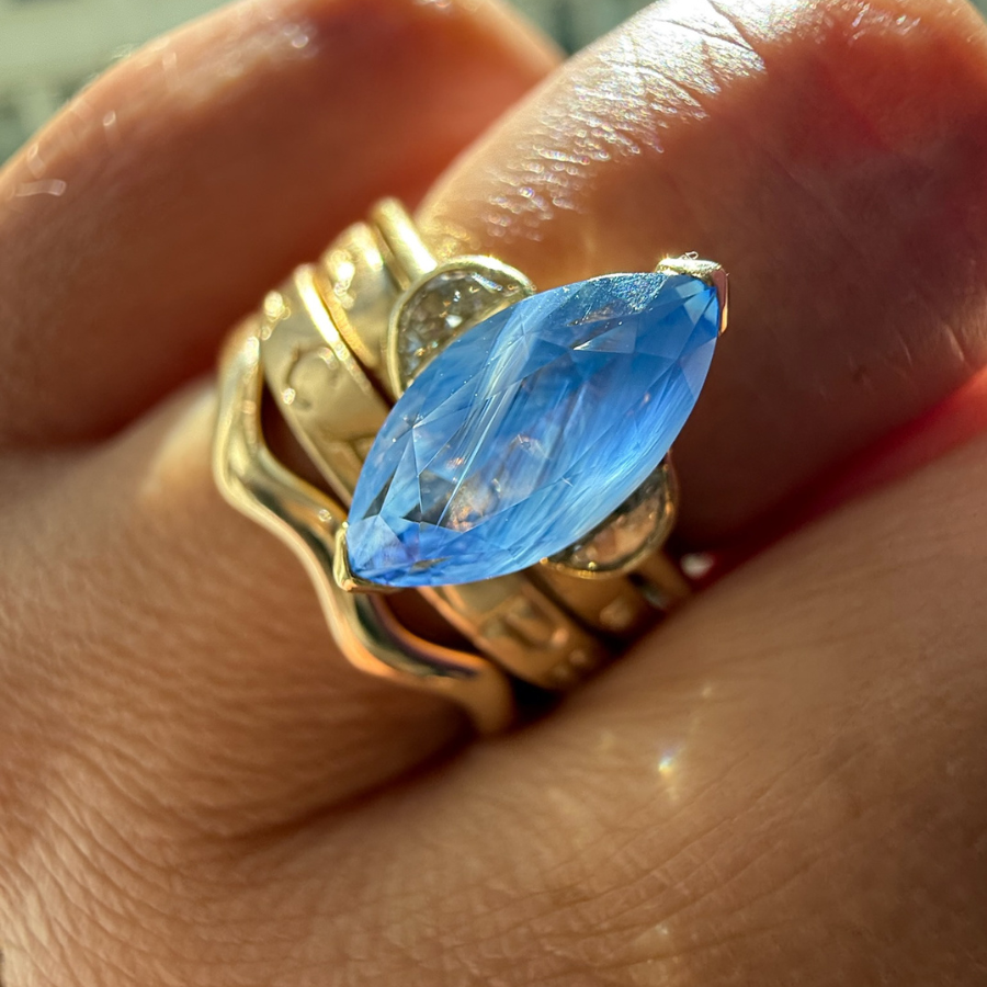 
            Blue Marquise Cut Opalescent Sapphire Ring