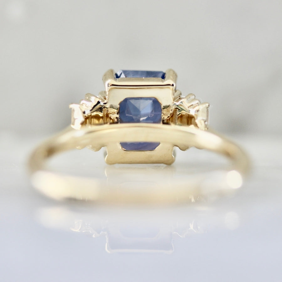 
            Blueberry Crumble Radiant Cut Opalescent Sapphire Ring