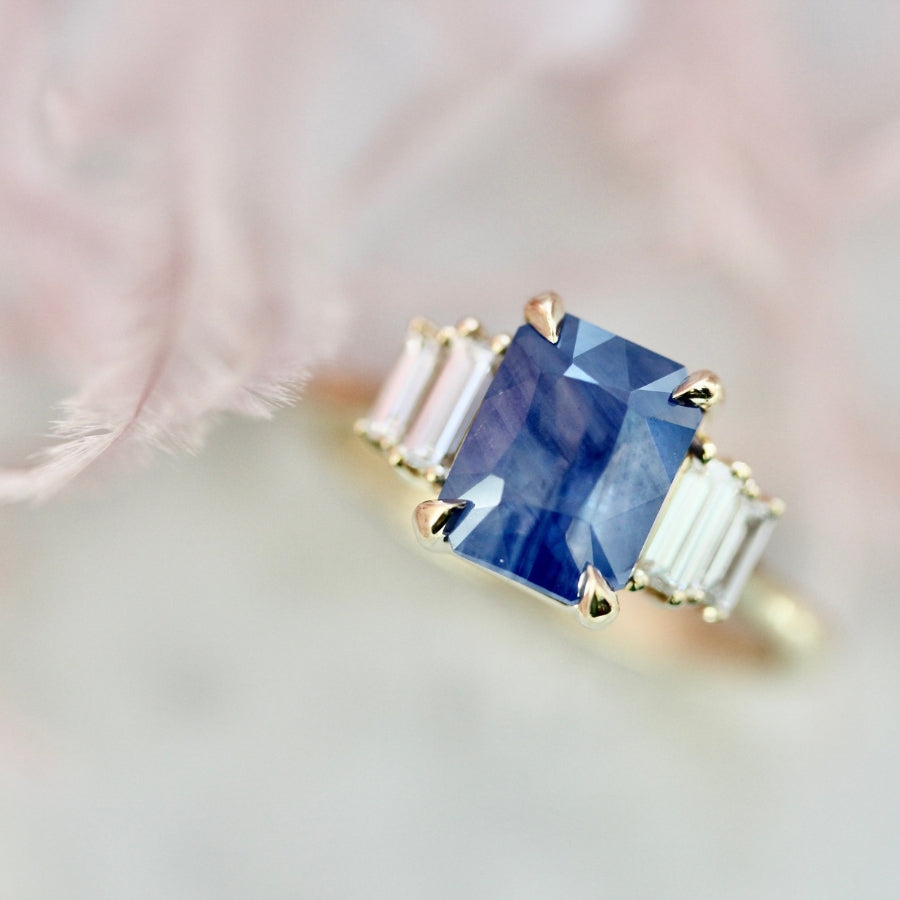 
            Blueberry Crumble Radiant Cut Opalescent Sapphire Ring