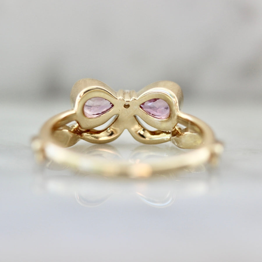 
            Bowtiful Pink Pear Sapphire Bow Ring