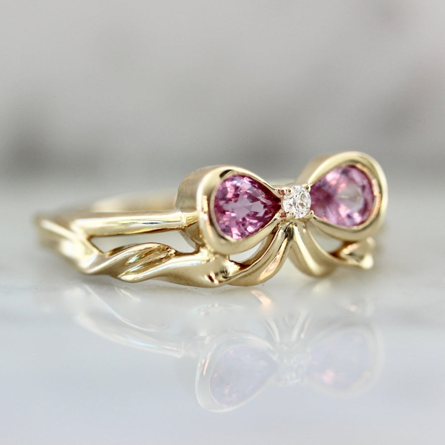 
            Bowtiful Pink Pear Sapphire Bow Ring